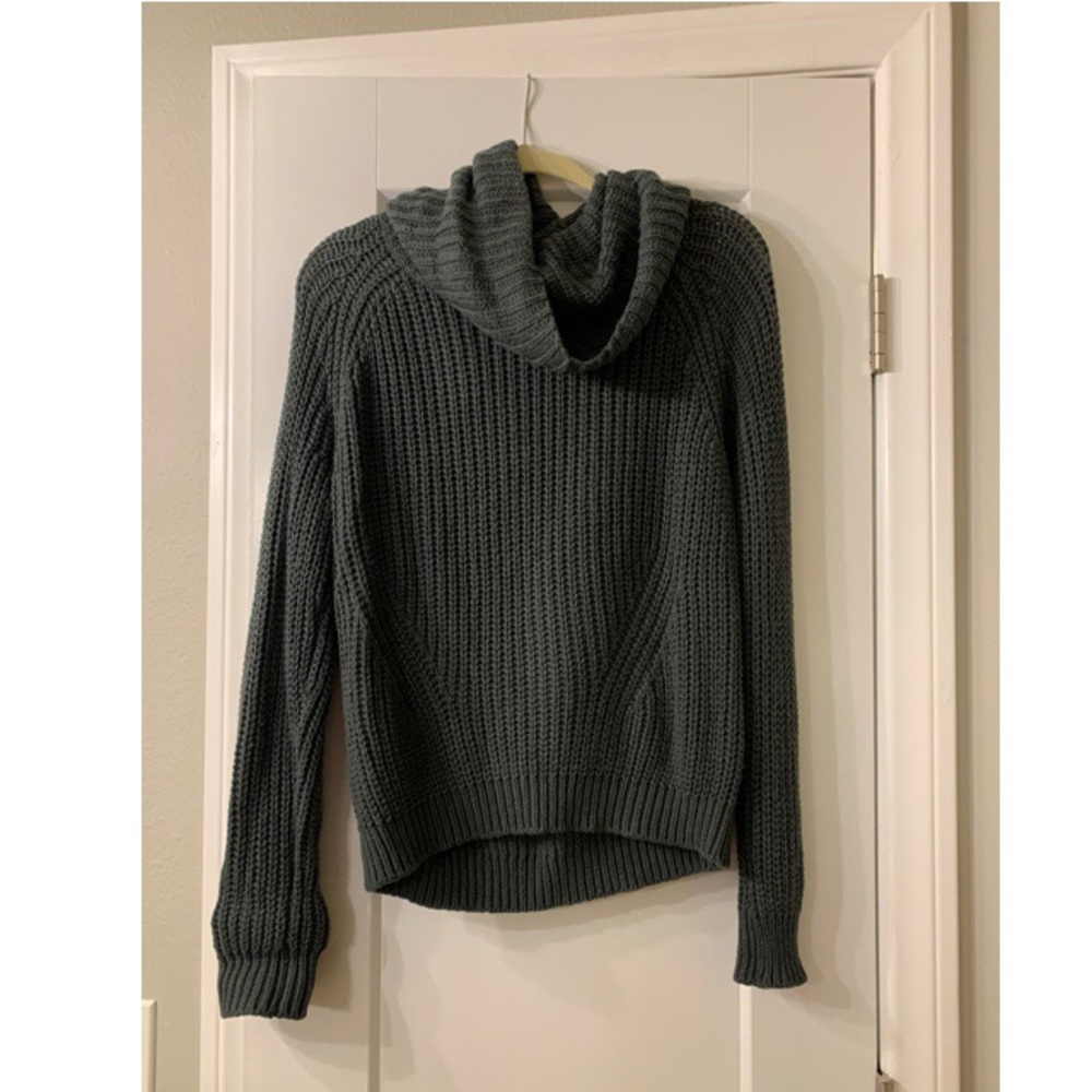 Turtle neck sweater.